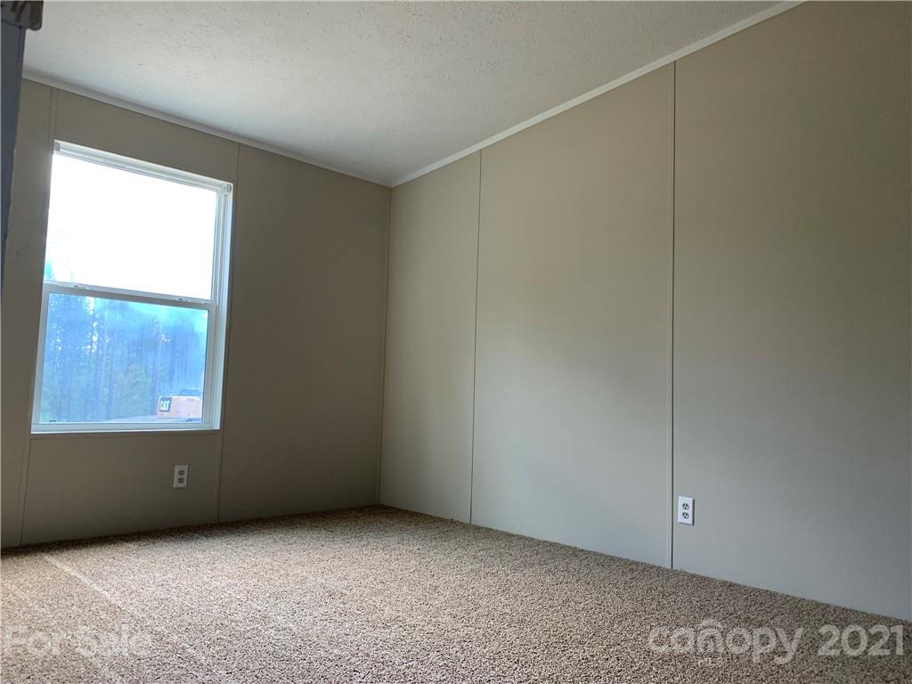 169 Mosley Road Blacksburg, SC 29702 - Photo 15 of 20 a view of an empty room with a window