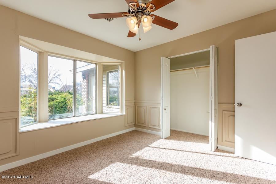 8049 East Barbara Road Prescott Valley, AZ 86314 - Photo 15 of 23 a view of an empty room with a window