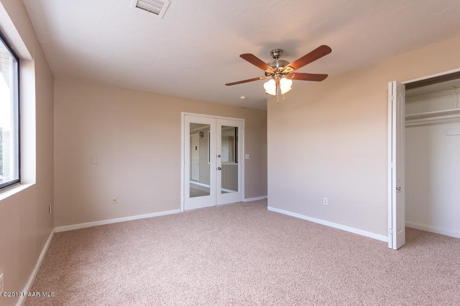 8049 East Barbara Road Prescott Valley, AZ 86314 - Photo 20 of 23 a view of an empty room