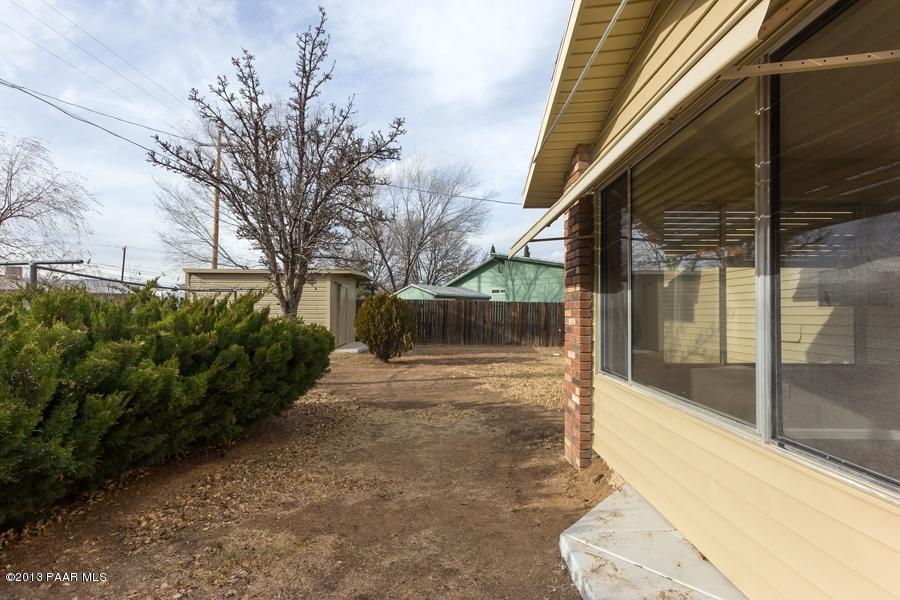 8049 East Barbara Road Prescott Valley, AZ 86314 - Photo 22 of 23 a view of backyard with patio