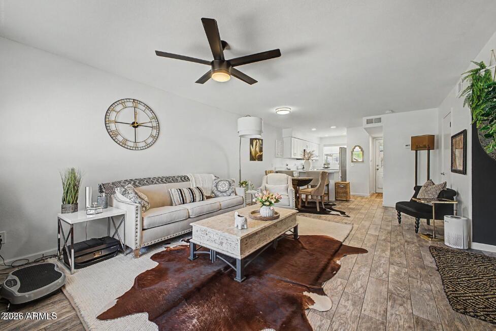 860 North McQueen Road, Unit 1135 Chandler, AZ 85225 - Photo 6 of 24 a living room with furniture