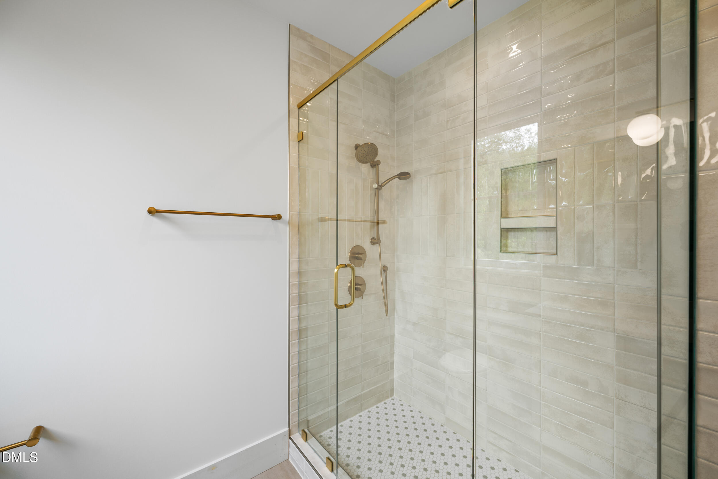 2817 Claremont Road Raleigh, NC 27608 - Photo 55 of 73 a bathroom with a shower and a sink