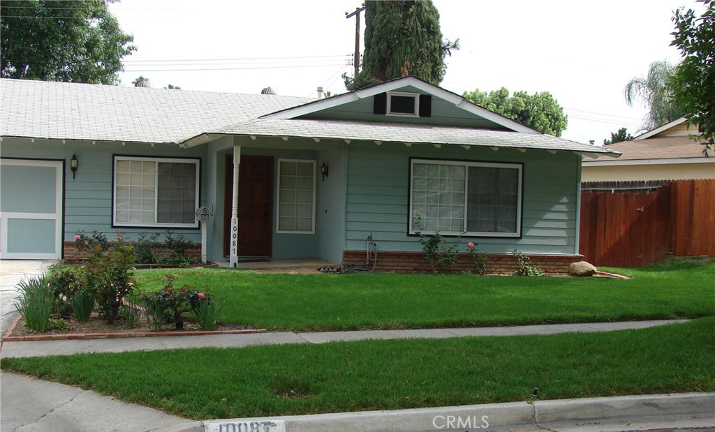 10087 Shady View Street Riverside, CA 92503 - Photo 1 of 1 a front view of a house with a yard