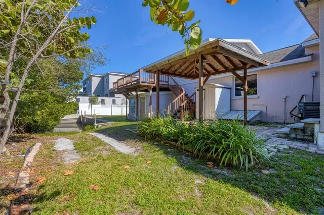 a view of a two chairs on the roof deck