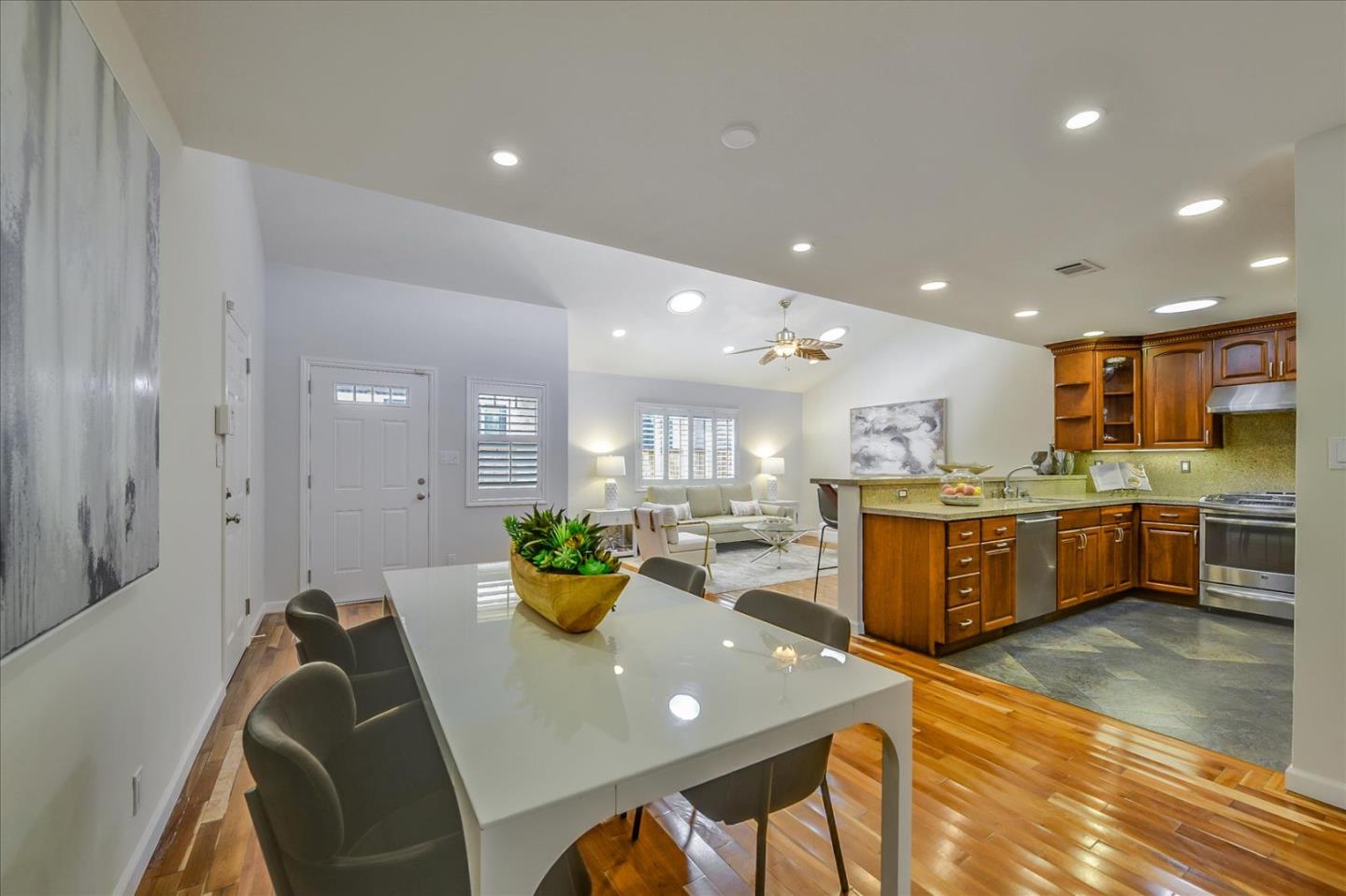 828 Linda Mar Boulevard Pacifica, CA 94044 - Photo 19 of 44 a kitchen with a sink a counter top space and stainless steel appliances