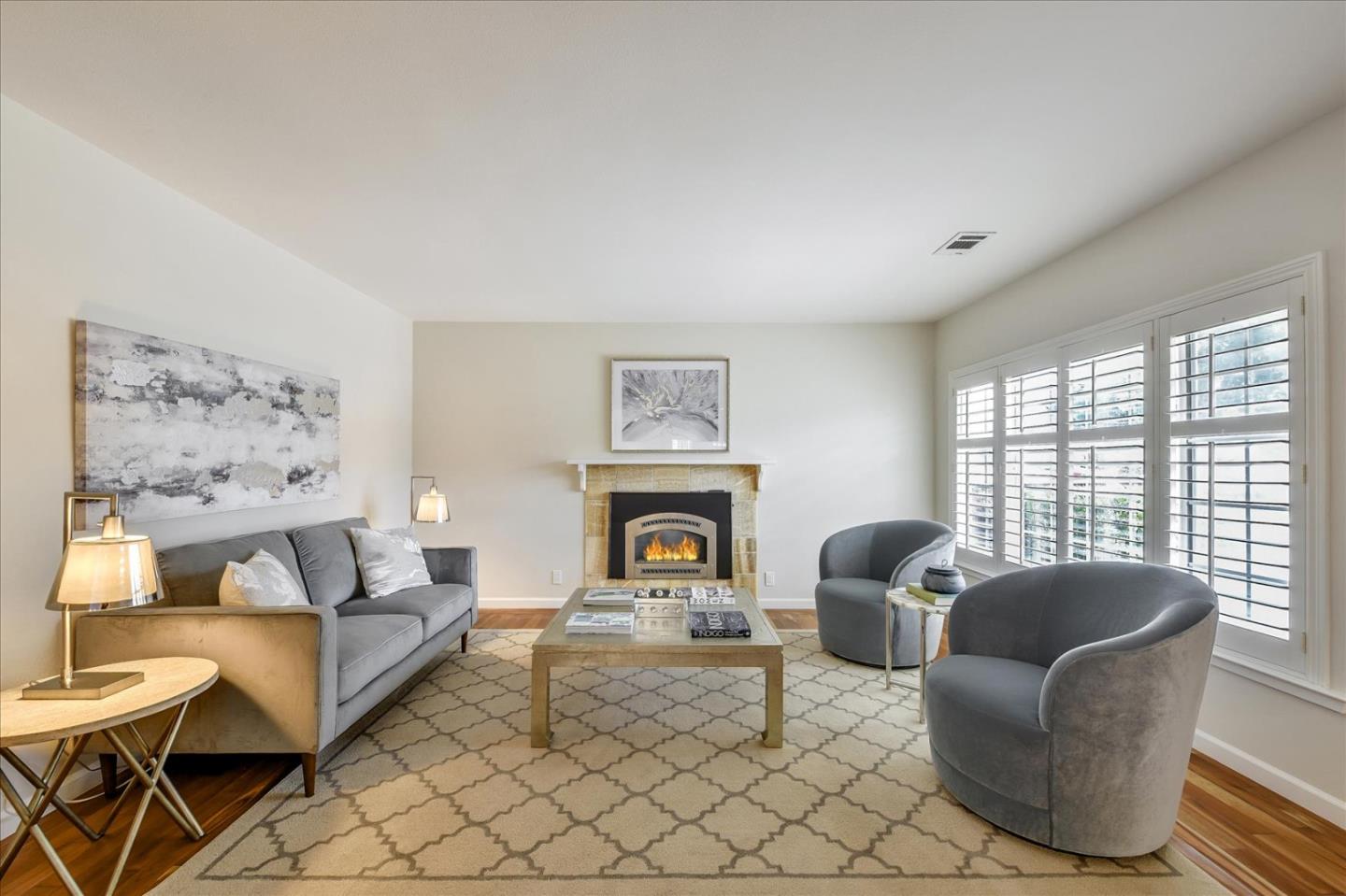 828 Linda Mar Boulevard Pacifica, CA 94044 - Photo 2 of 44 a living room with furniture a fireplace and a large window