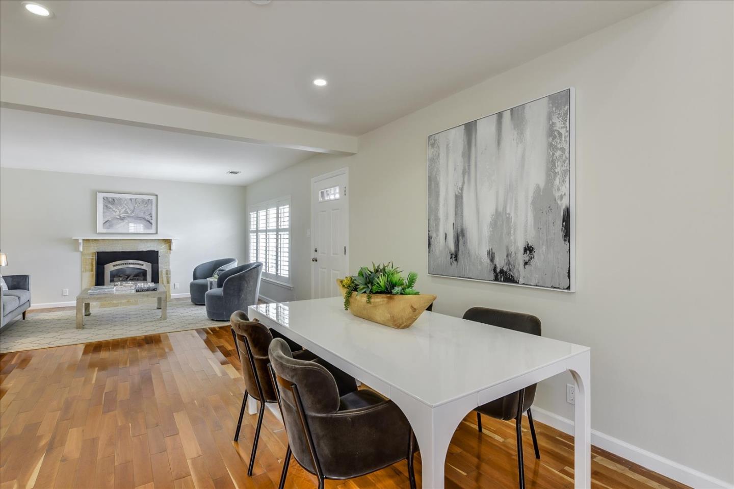 828 Linda Mar Boulevard Pacifica, CA 94044 - Photo 21 of 44 a view of a dining room with furniture and wooden floor