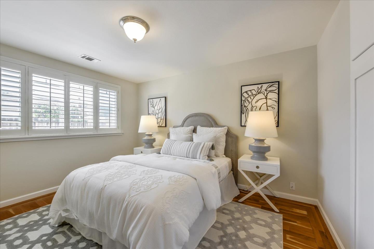 828 Linda Mar Boulevard Pacifica, CA 94044 - Photo 26 of 44 a bedroom with a bed and a window