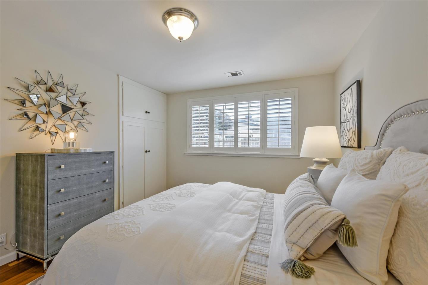 828 Linda Mar Boulevard Pacifica, CA 94044 - Photo 27 of 44 a bedroom with a bed and window