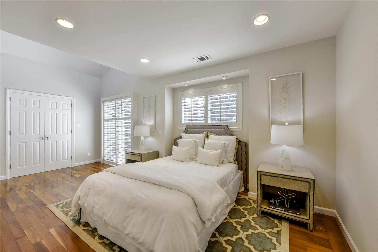 828 Linda Mar Boulevard Pacifica, CA 94044 - Photo 30 of 44 a bedroom with a bed and a window