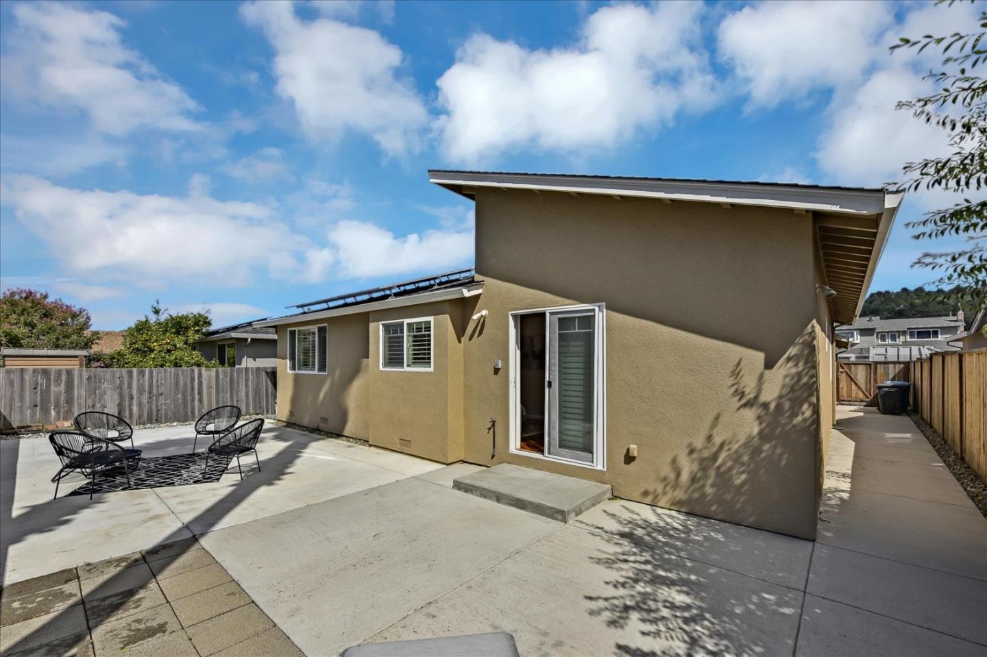 828 Linda Mar Boulevard Pacifica, CA 94044 - Photo 37 of 44 a view of a house with a patio