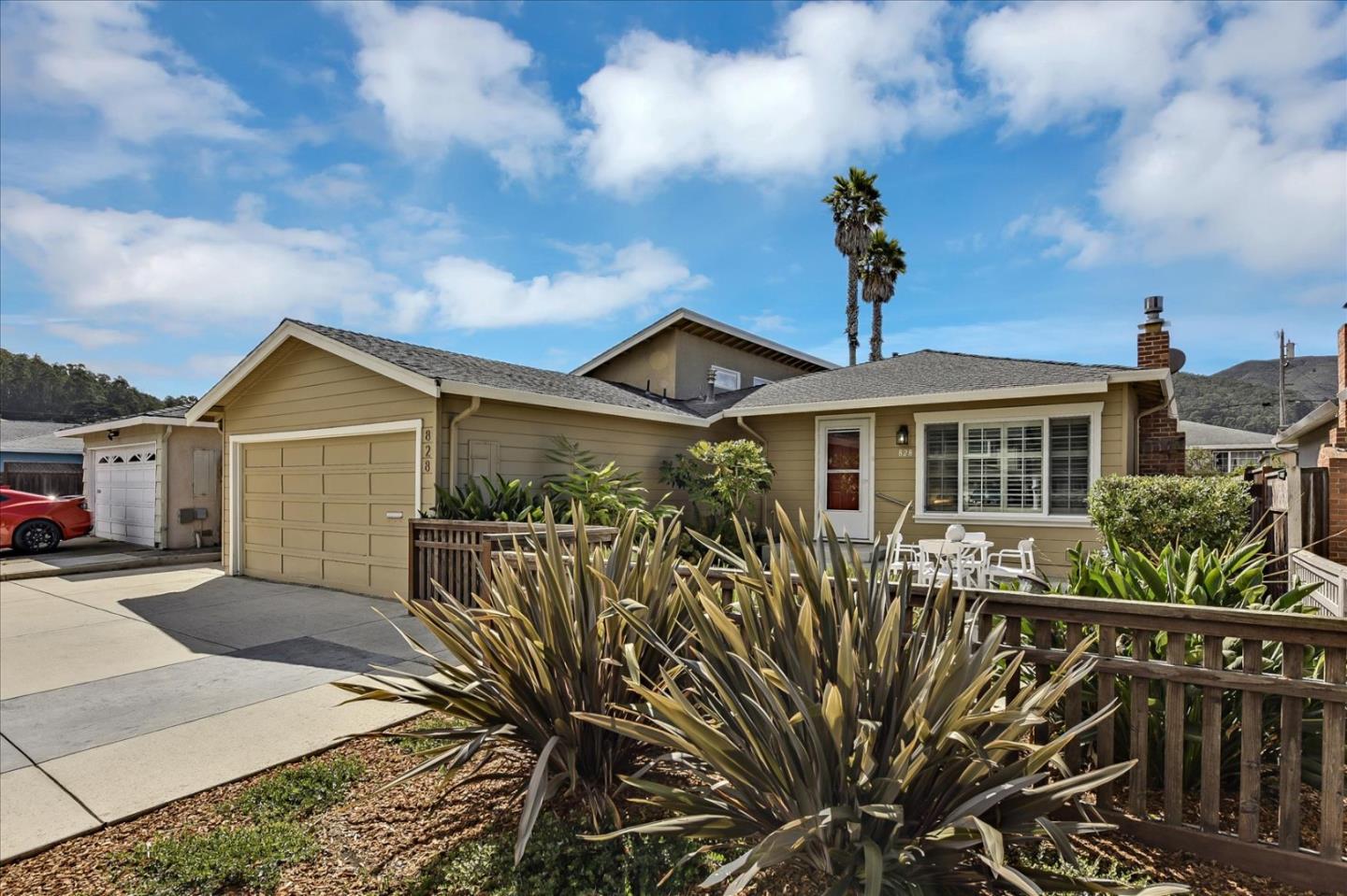 828 Linda Mar Boulevard Pacifica, CA 94044 - Photo 6 of 44 a view of a house with wooden fence