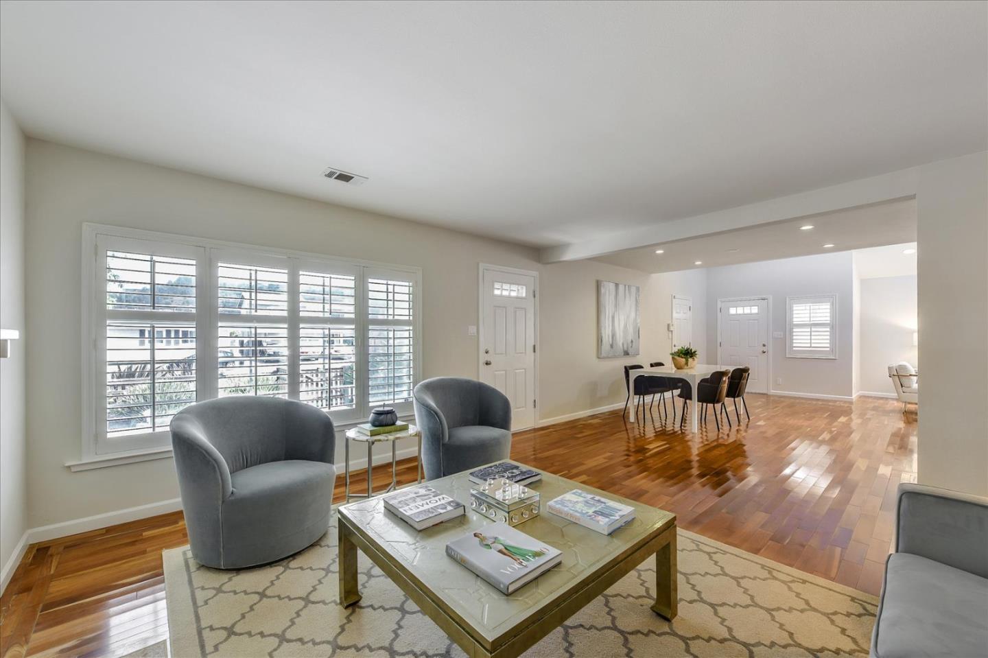 828 Linda Mar Boulevard Pacifica, CA 94044 - Photo 9 of 44 a living room with furniture and a large window