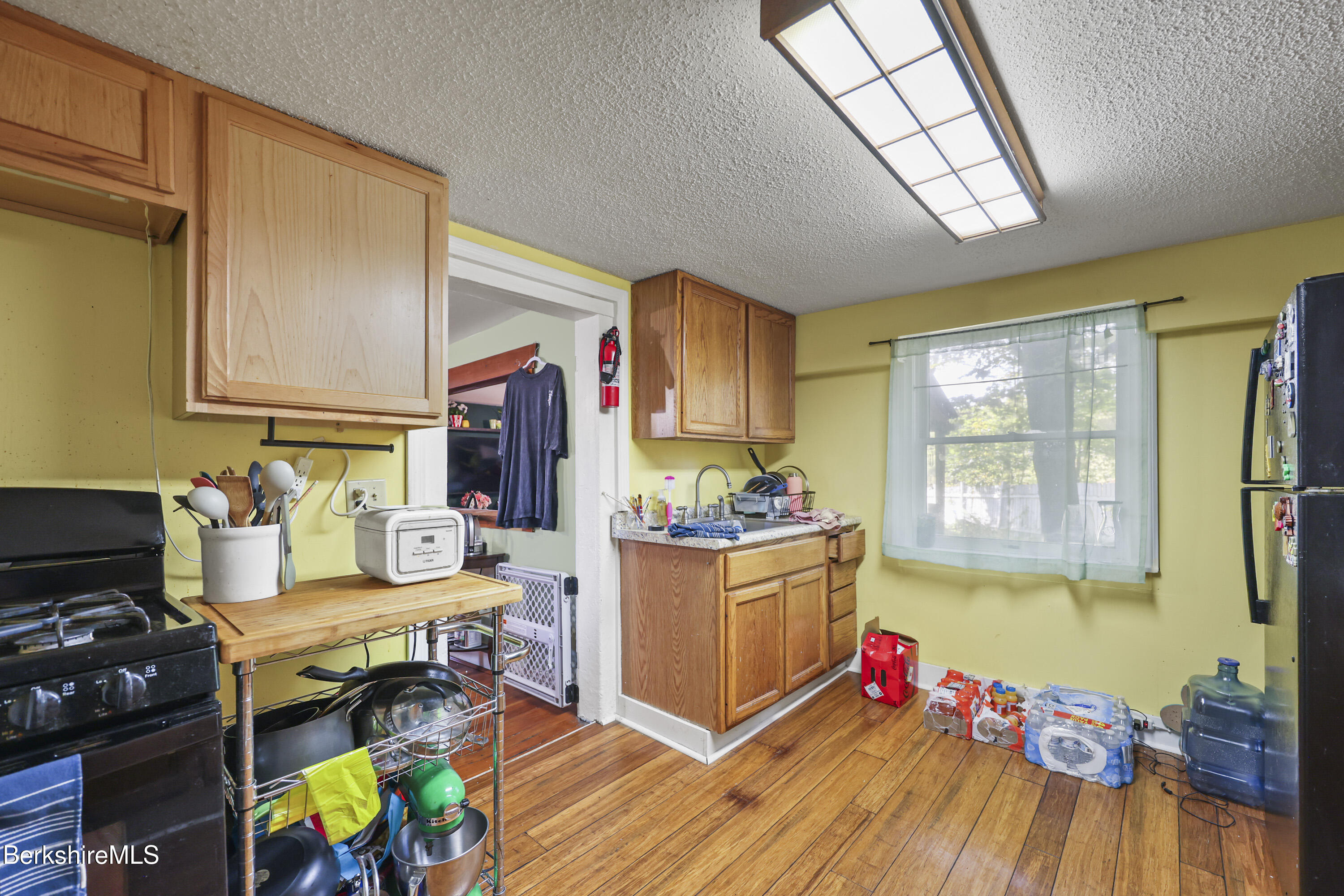 1 Maple Street Hinsdale, MA 01235 - Photo 14 of 17 a living room with furniture and a wooden floor