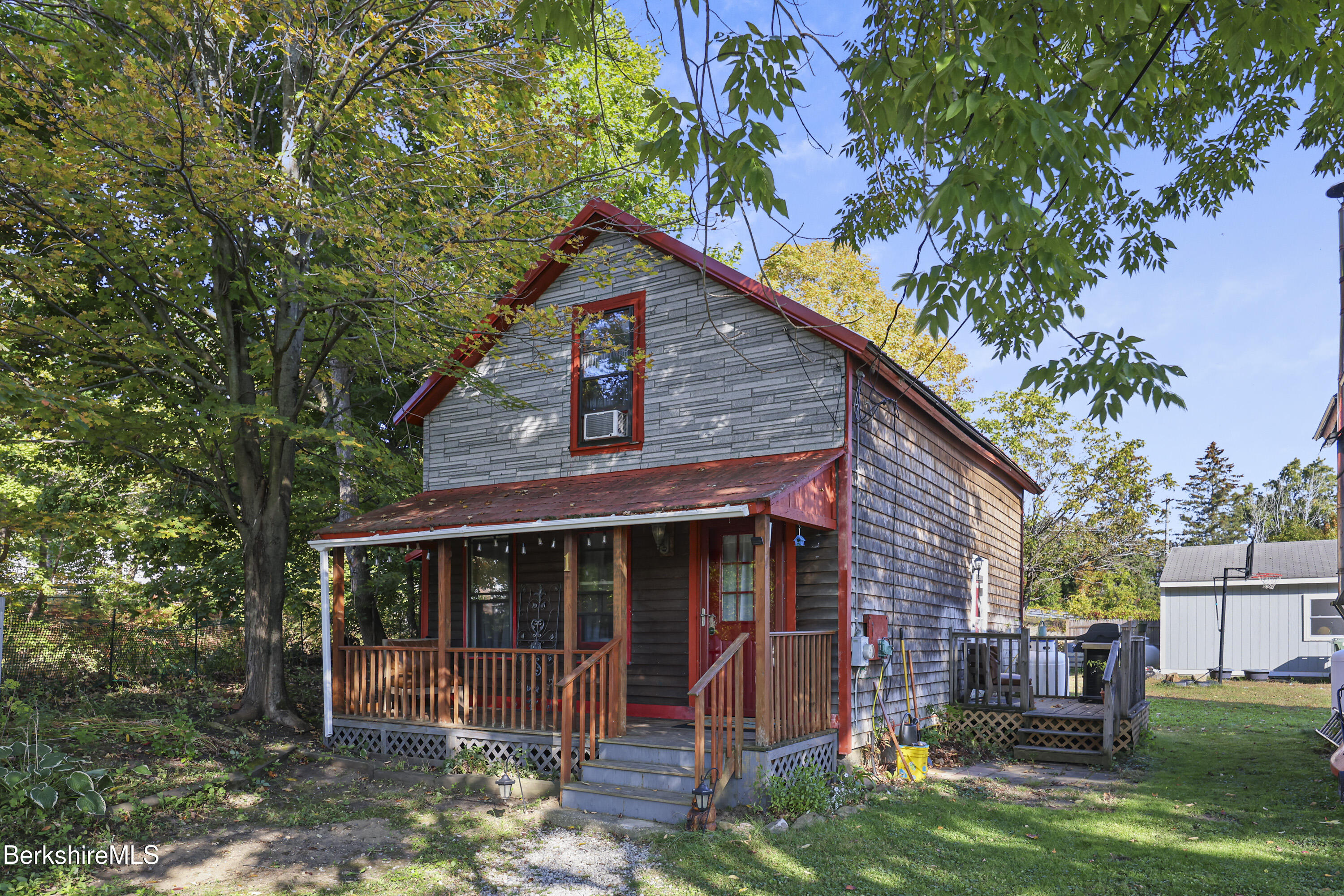1 Maple Street Hinsdale, MA 01235 - Photo 2 of 17 a view of a house with a yard plants and large tree