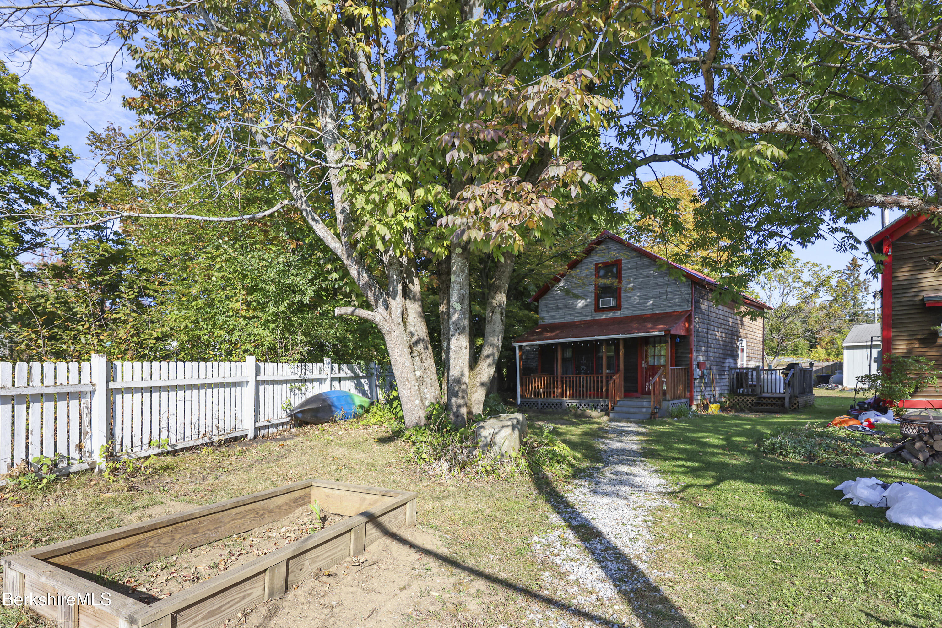 1 Maple Street Hinsdale, MA 01235 - Photo 3 of 17 a front view of a house with garden