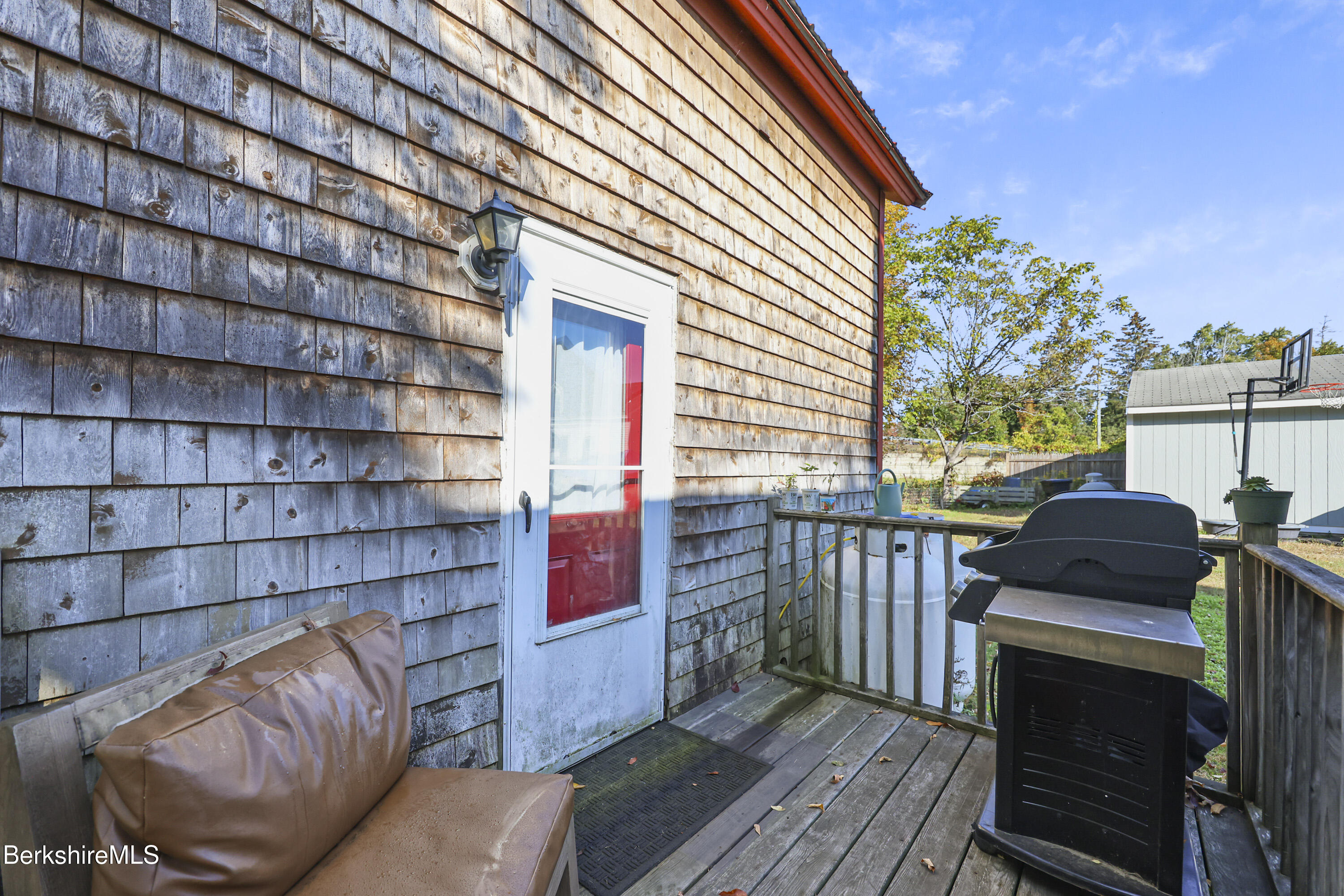 1 Maple Street Hinsdale, MA 01235 - Photo 4 of 17 a view of a balcony with furniture