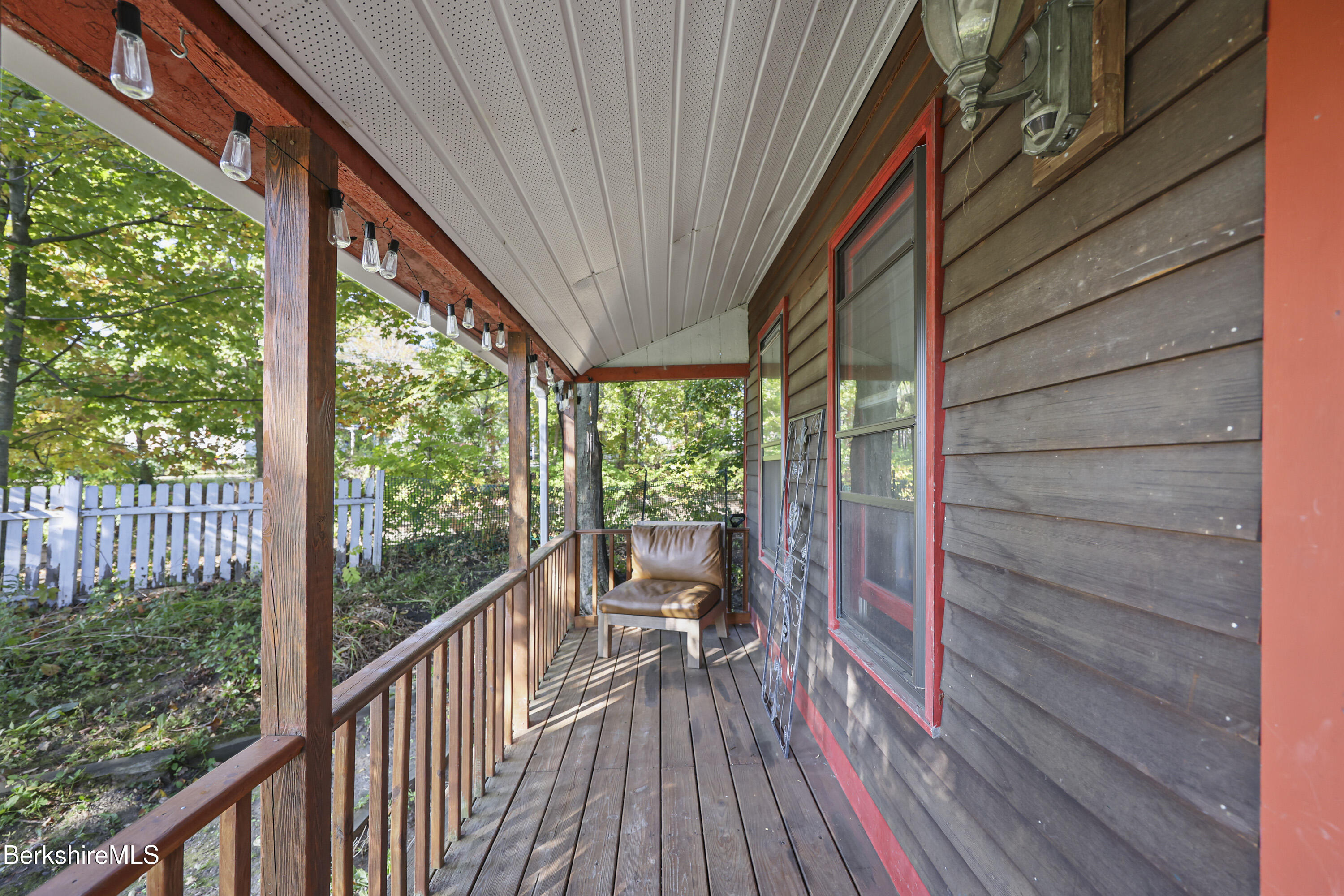 1 Maple Street Hinsdale, MA 01235 - Photo 6 of 17 a view of a balcony with chairs and wooden floor
