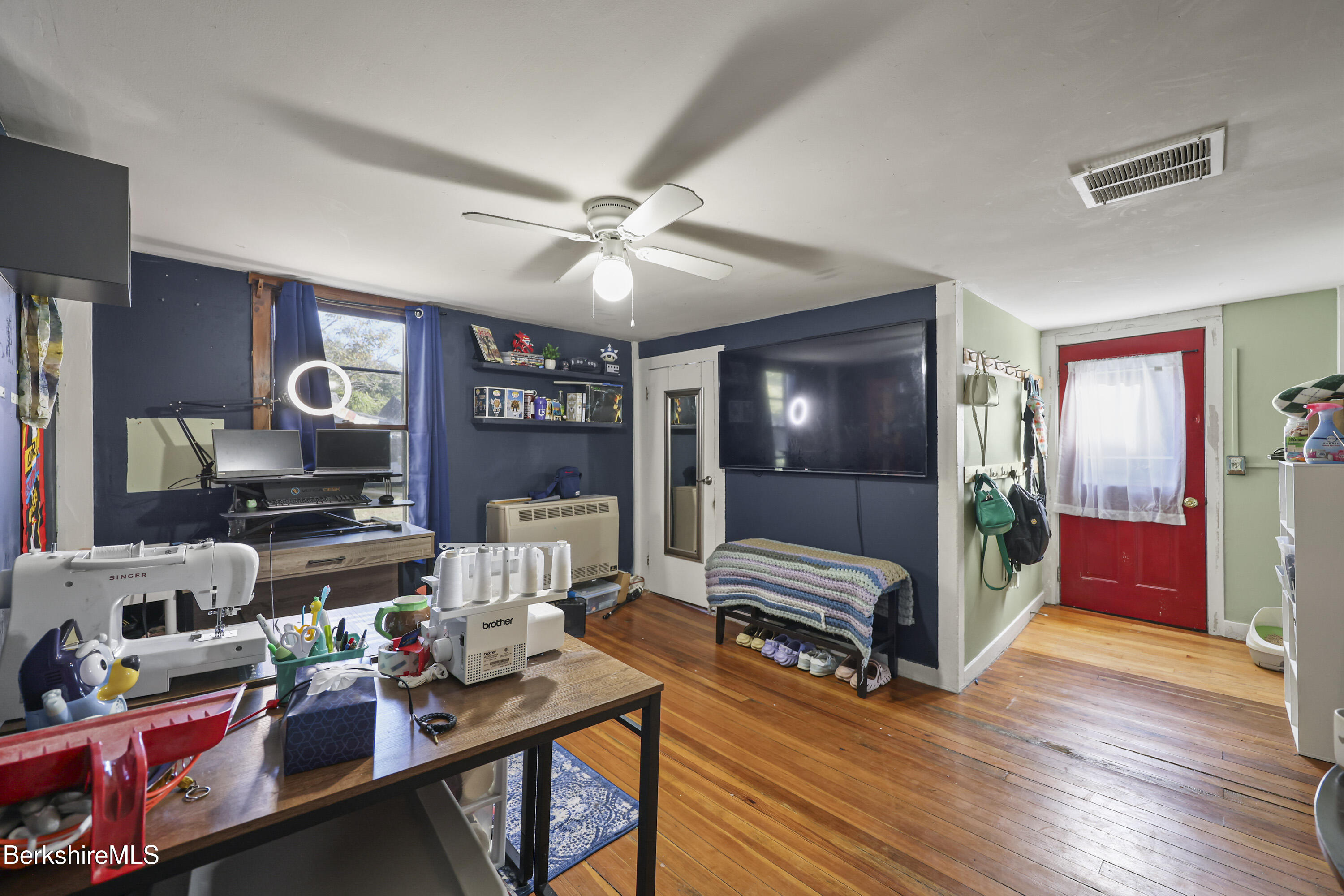 1 Maple Street Hinsdale, MA 01235 - Photo 10 of 17 a living room with furniture and a flat screen tv
