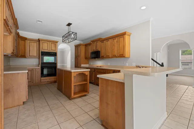 a kitchen with a cabinets and counter space