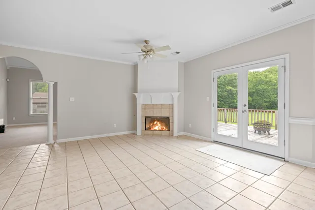 a view of a kitchen with furniture and a fireplace