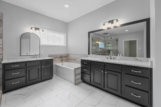 a view of an empty room with closet and a chandelier fan