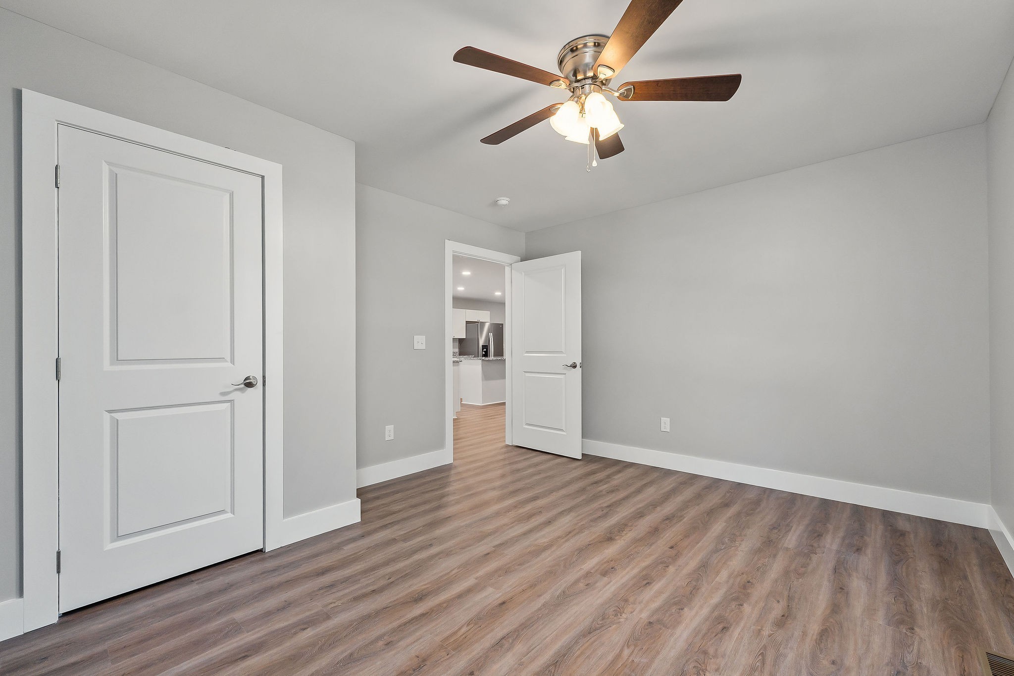 1053 Benton Tidwell Road Hilham, TN 38568 - Photo 15 of 39 wooden floor in an empty room with a window