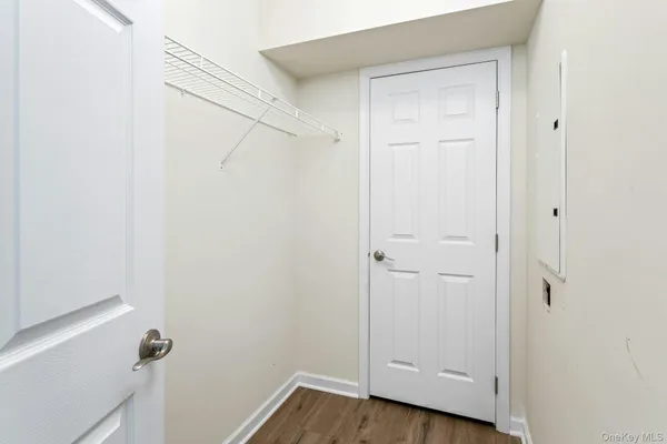 a bathroom with a toilet a sink and a shower