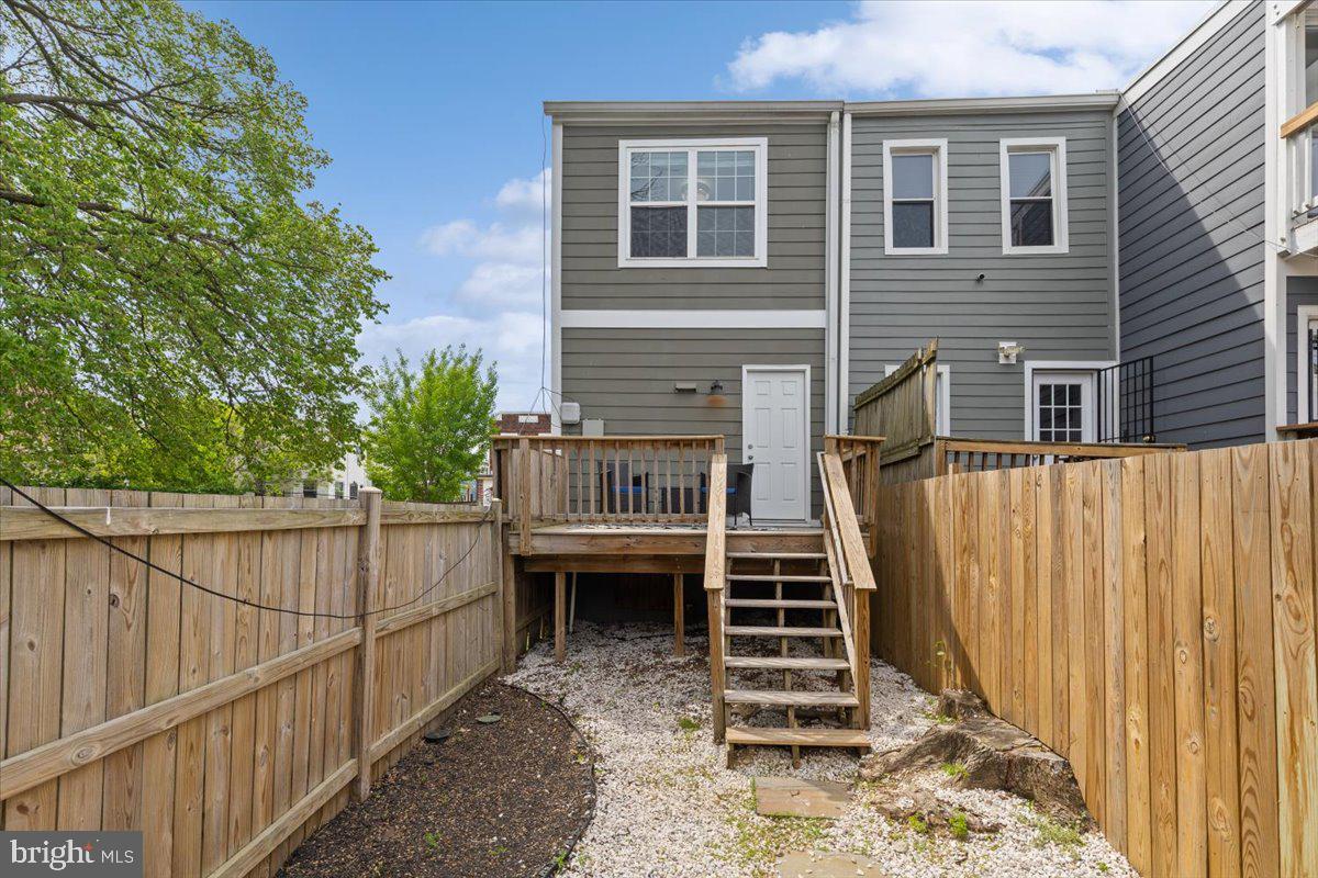 635 20th Street Northeast Washington, DC 20002 - Photo 29 of 33 a view of a house with wooden fence and a windows