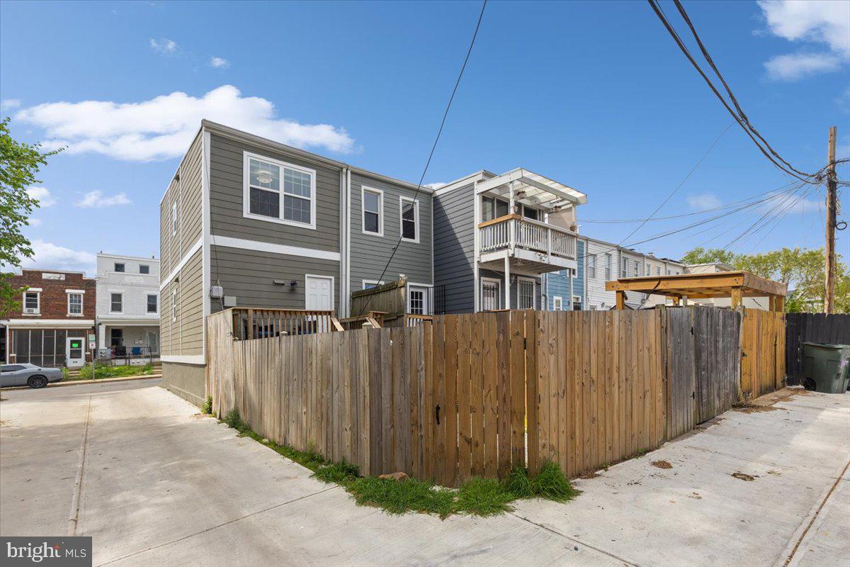 635 20th Street Northeast Washington, DC 20002 - Photo 30 of 33 a front view of a house with a fence
