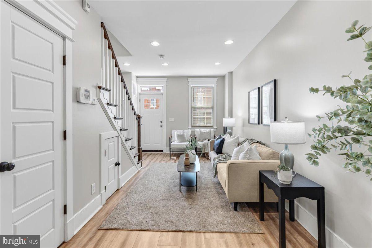 635 20th Street Northeast Washington, DC 20002 - Photo 6 of 33 a living room with furniture and wooden floor
