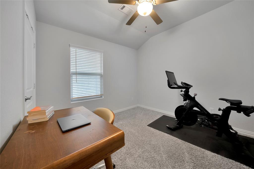 1817 Berry Rdg Trail Aubrey, TX 76227 - Photo 20 of 30 a bedroom with furniture and a window