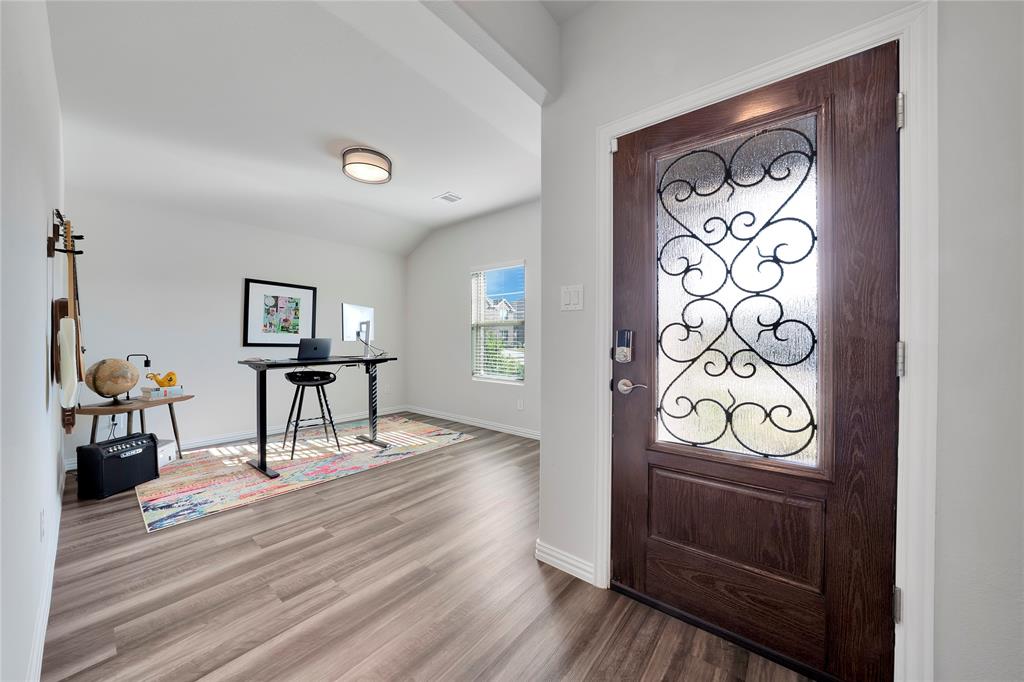 1817 Berry Rdg Trail Aubrey, TX 76227 - Photo 2 of 30 a view of a door and wooden floor