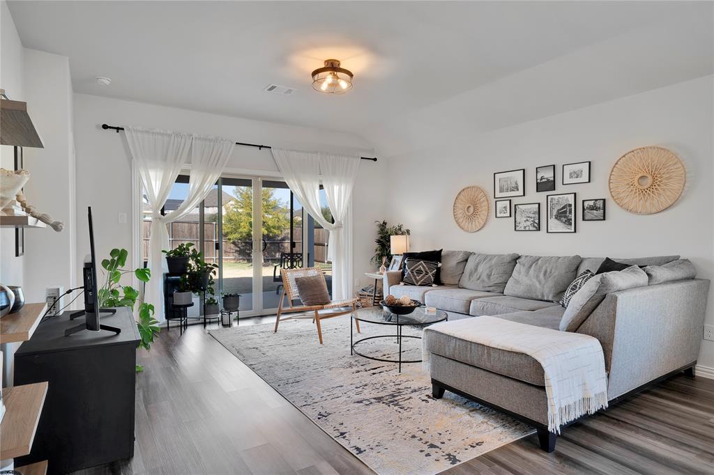 1817 Berry Rdg Trail Aubrey, TX 76227 - Photo 6 of 30 a living room with furniture and a large window