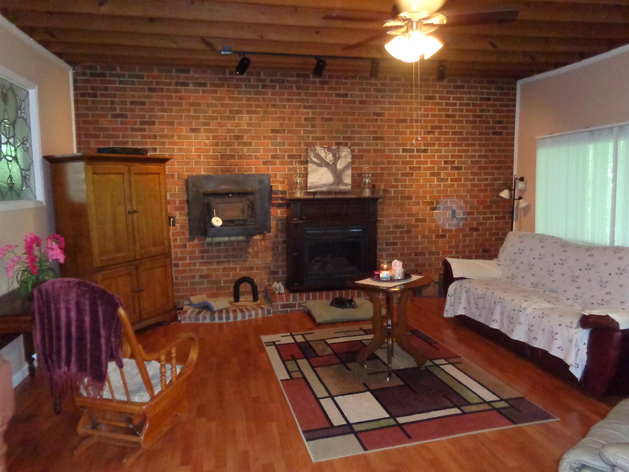 1530 Gratton Road Clarksville, TN 37043 - Photo 30 of 30 a living room with furniture and a fireplace