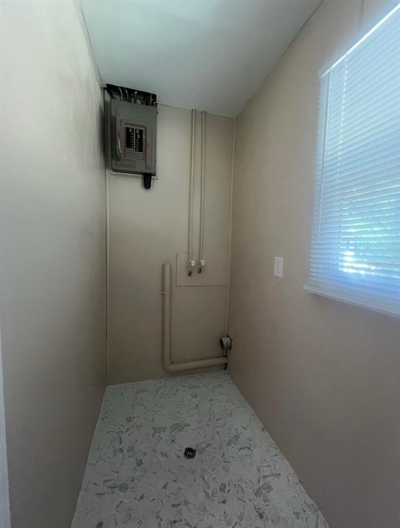 15 Haselton Street Eustis, FL 32726 - Photo 9 of 10 an empty room with a empty space and a window