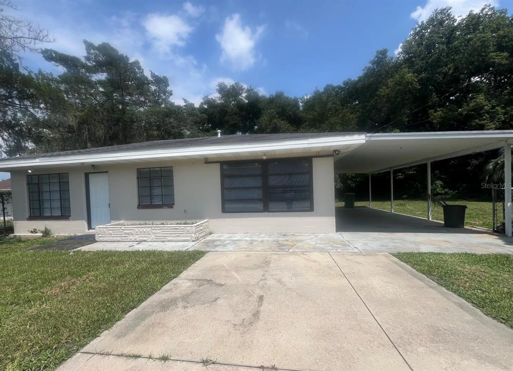15 Haselton Street Eustis, FL 32726 - Photo 10 of 10 front view of a house with a yard