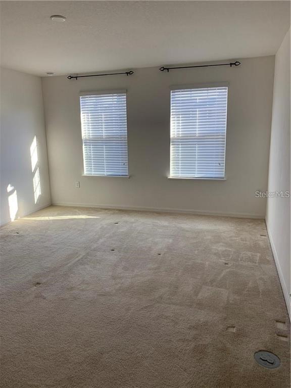 3826 Exeter Lane Lakeland, FL 33809 - Photo 7 of 10 an empty room with windows