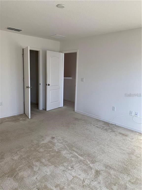 3826 Exeter Lane Lakeland, FL 33809 - Photo 9 of 10 a view of an empty room and closet area