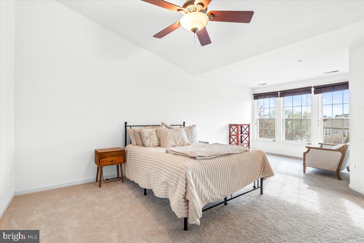 1729 Emory Street Frederick, MD 21701 - Photo 17 of 50 a bedroom with a bed couch and window