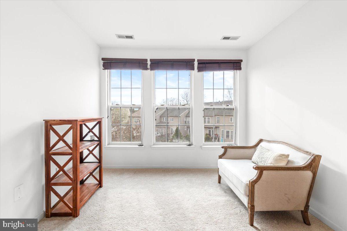 1729 Emory Street Frederick, MD 21701 - Photo 20 of 50 a living room with furniture and a large window