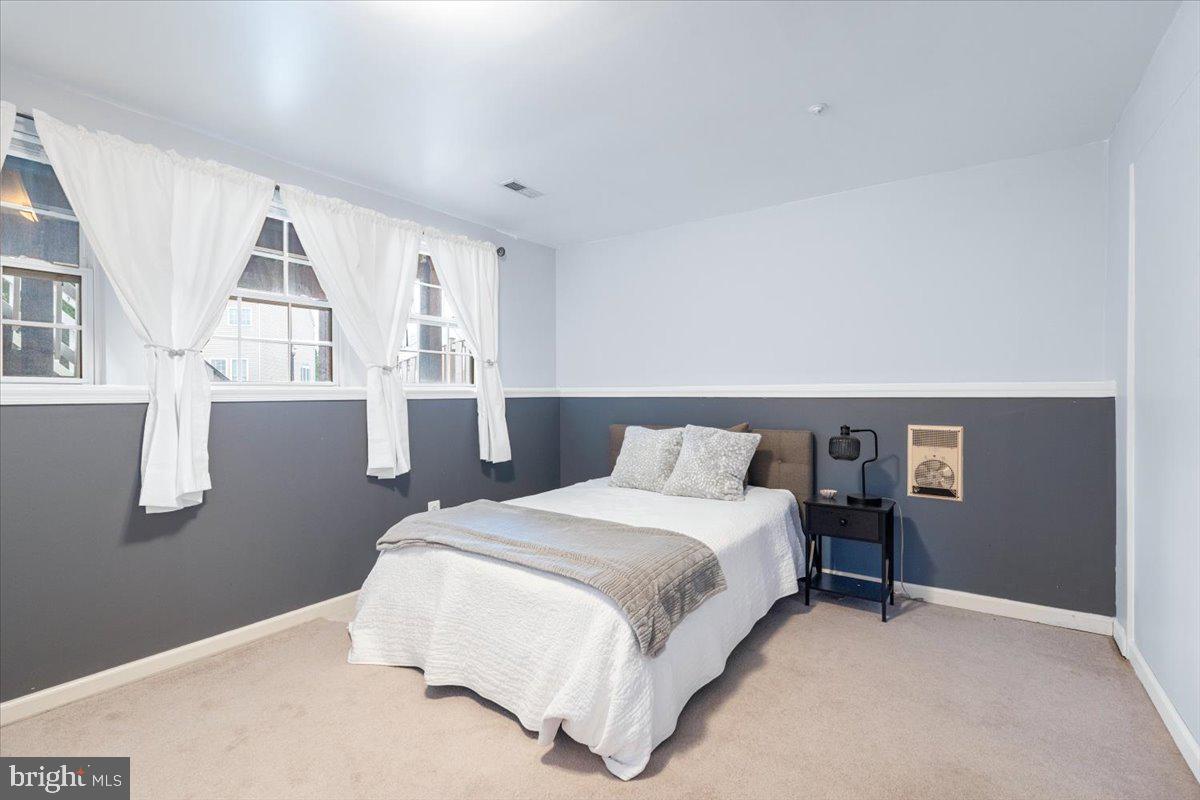 1729 Emory Street Frederick, MD 21701 - Photo 31 of 50 a bedroom with a bed and a window