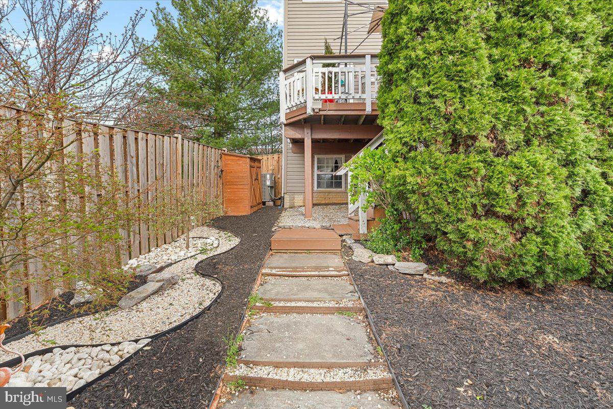 1729 Emory Street Frederick, MD 21701 - Photo 36 of 50 a front view of a house with a yard and trees