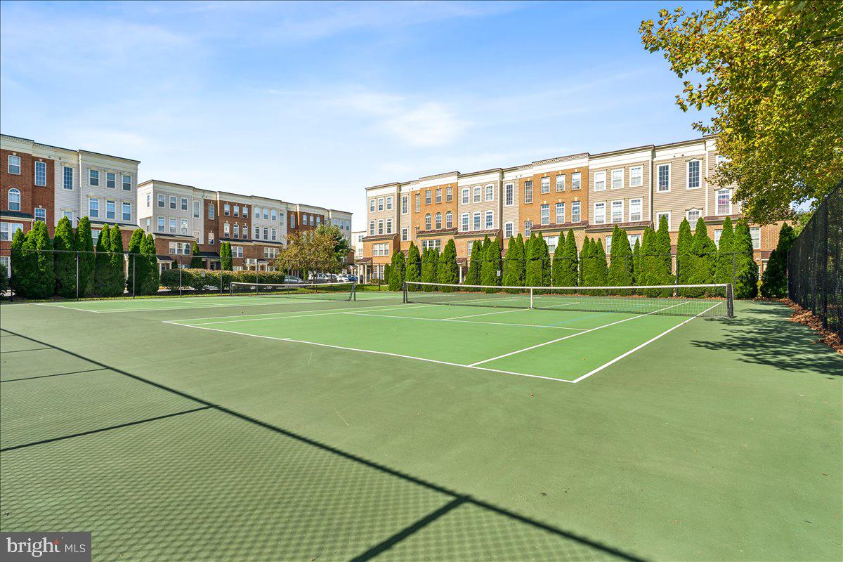 1729 Emory Street Frederick, MD 21701 - Photo 45 of 50 a view of a tennis ground with large trees