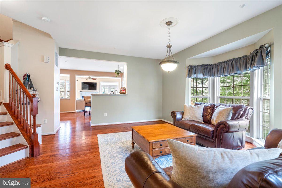 1729 Emory Street Frederick, MD 21701 - Photo 9 of 50 a living room with furniture and a wooden floor