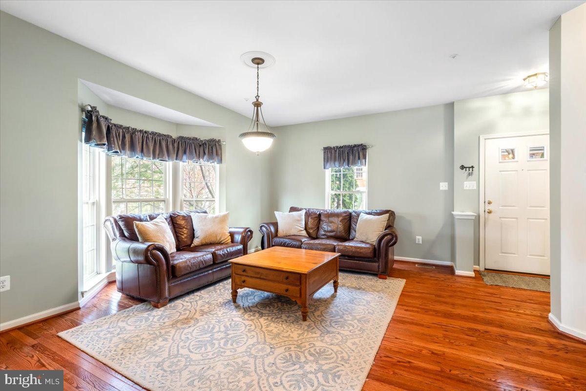1729 Emory Street Frederick, MD 21701 - Photo 10 of 50 a living room with furniture rug and window