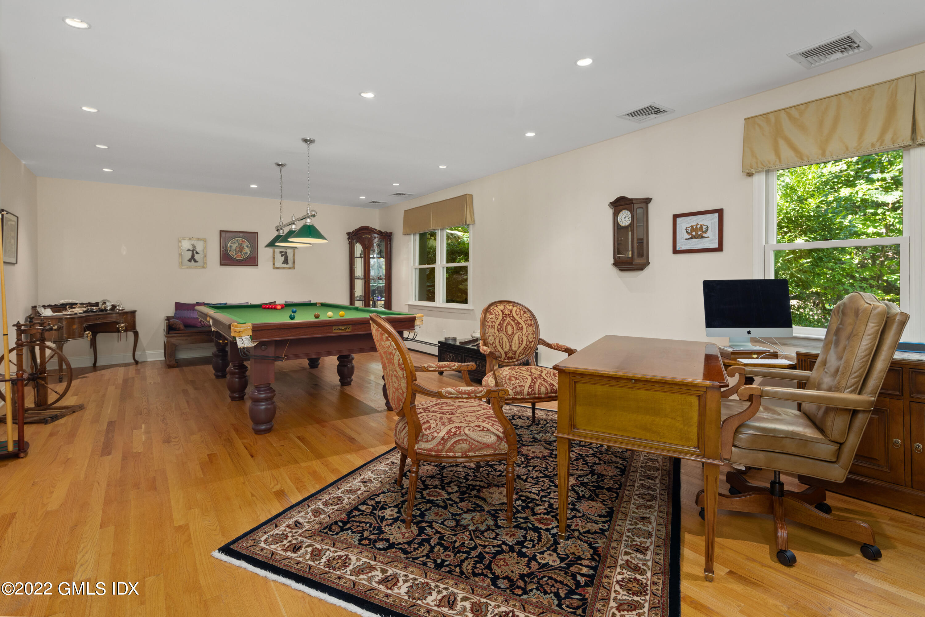 27 Rustic View Road Greenwich, CT 06830 - Photo 11 of 37 a living room with furniture and a flat screen tv