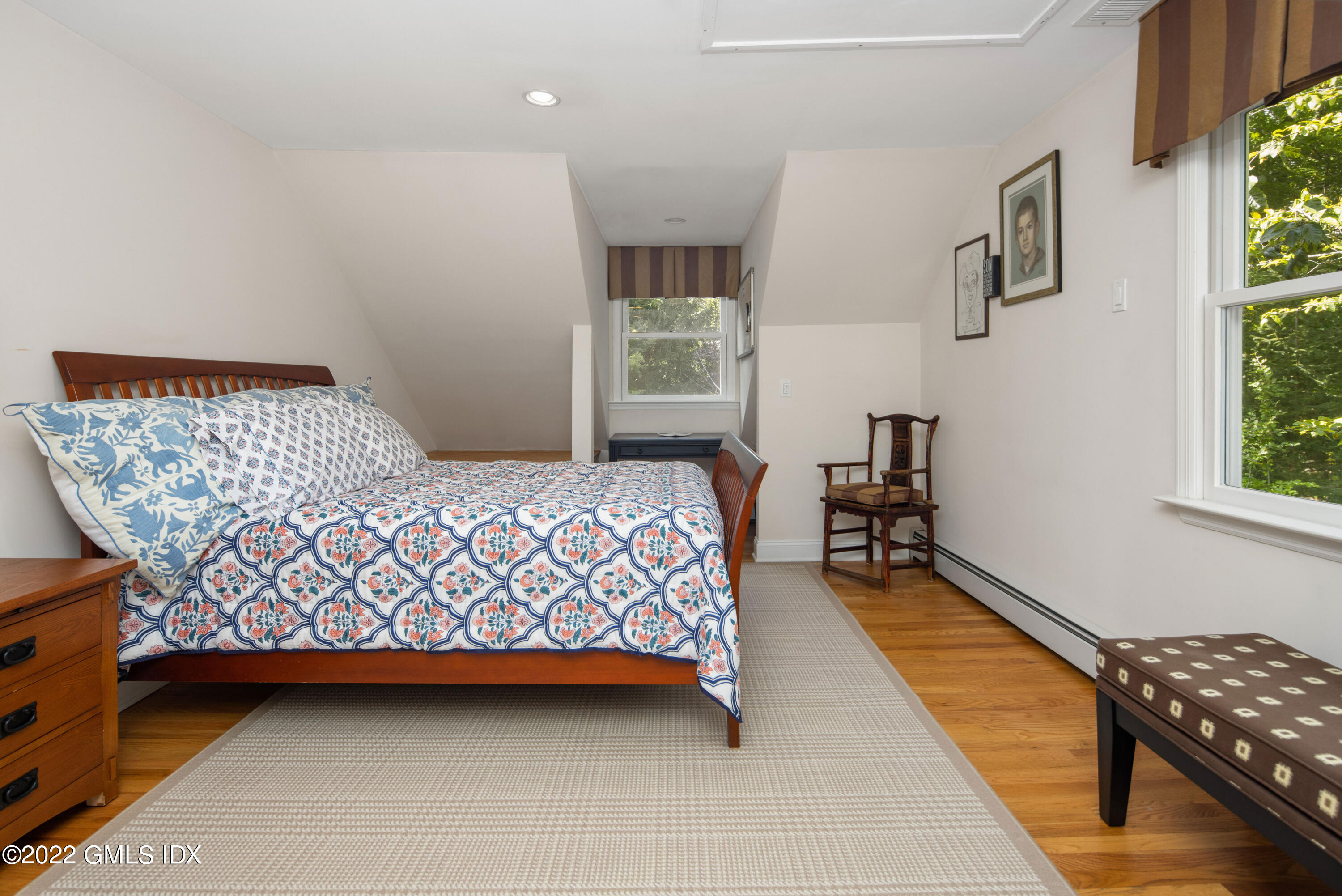 27 Rustic View Road Greenwich, CT 06830 - Photo 20 of 37 a bedroom with furniture and a window