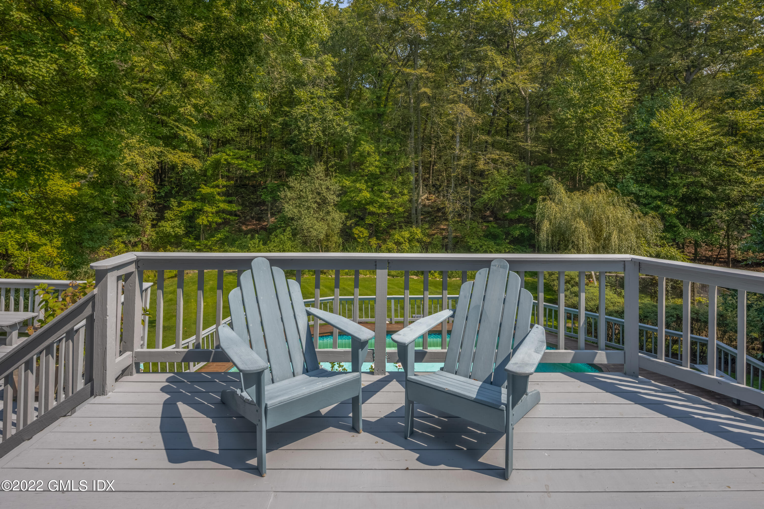 27 Rustic View Road Greenwich, CT 06830 - Photo 24 of 37 a view of a two chairs in the deck