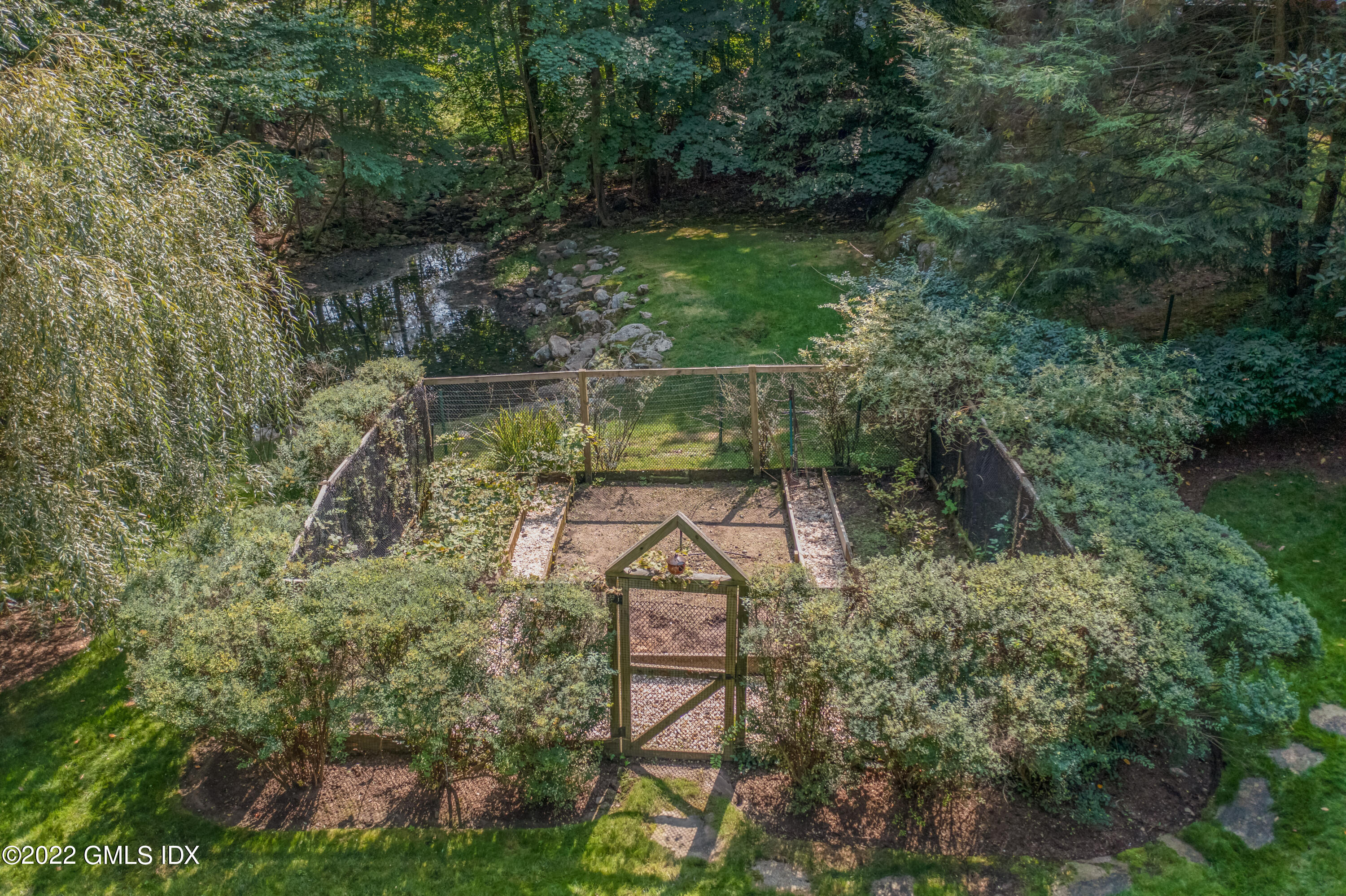 27 Rustic View Road Greenwich, CT 06830 - Photo 30 of 37 a view of a garden